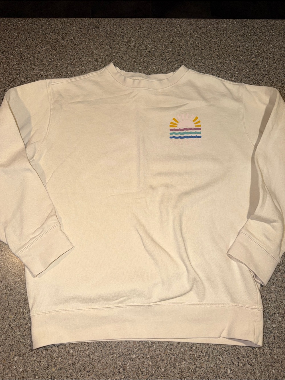 surf style Cream Crewneck Sweatshirt with Sunrise Graphic
